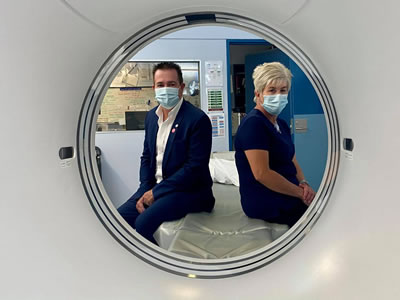 Bathurst MP Paul Toole viewing Lithgow Hospital's MRI machine up close with chief radiologist Michelle Bostock