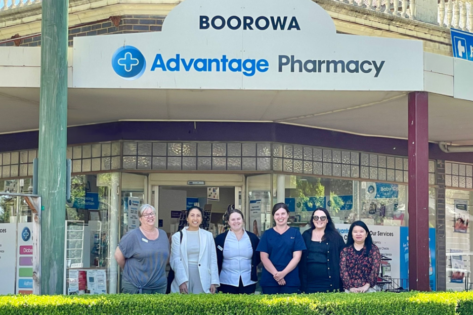 Six women standing and smiling outside of Boorowa Advantage Pharmacy