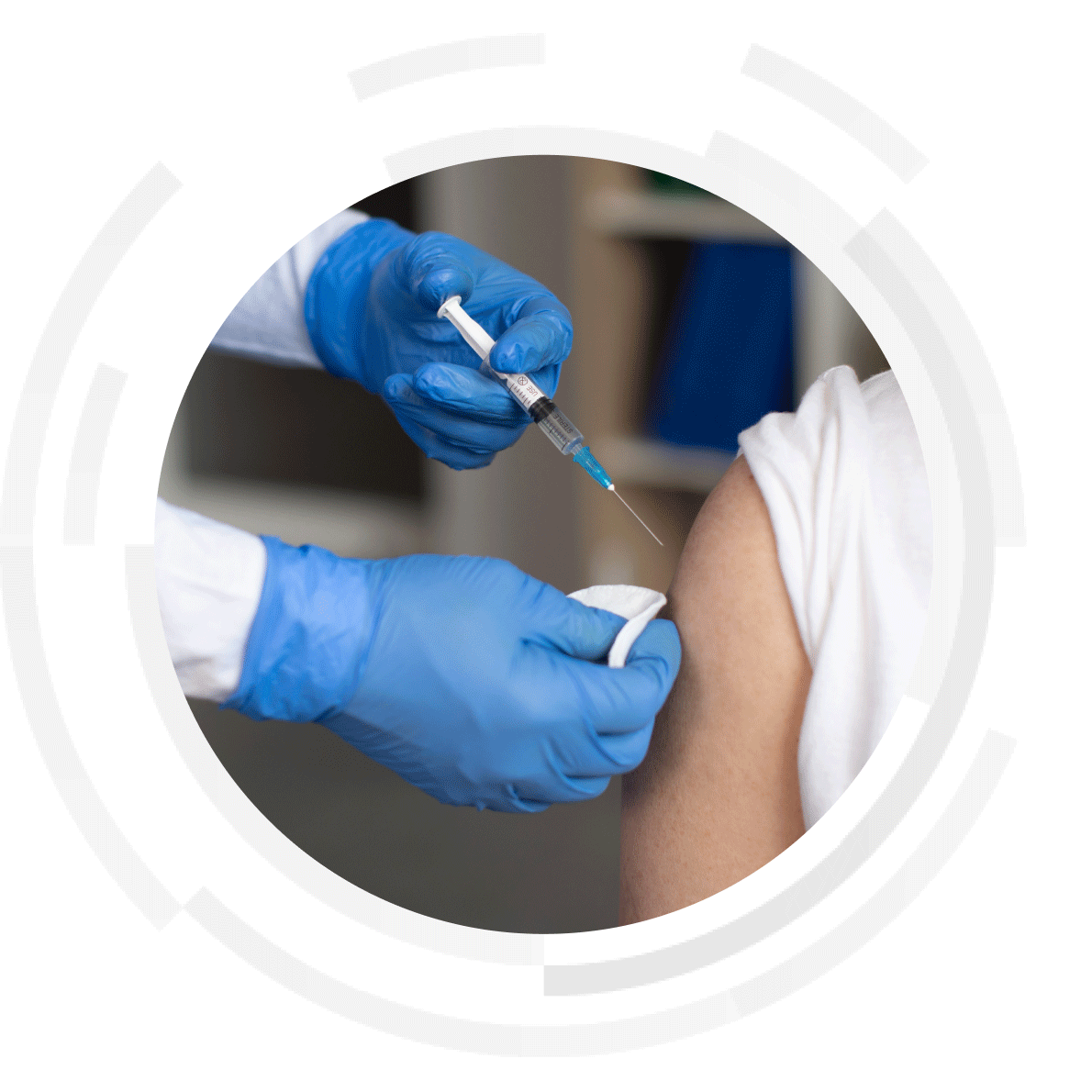 Man getting a vaccination in the arm.
