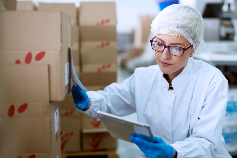 Warehouse worker checks stock